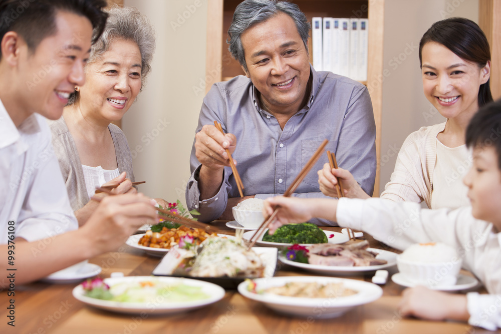 Happy family enjoying meal time