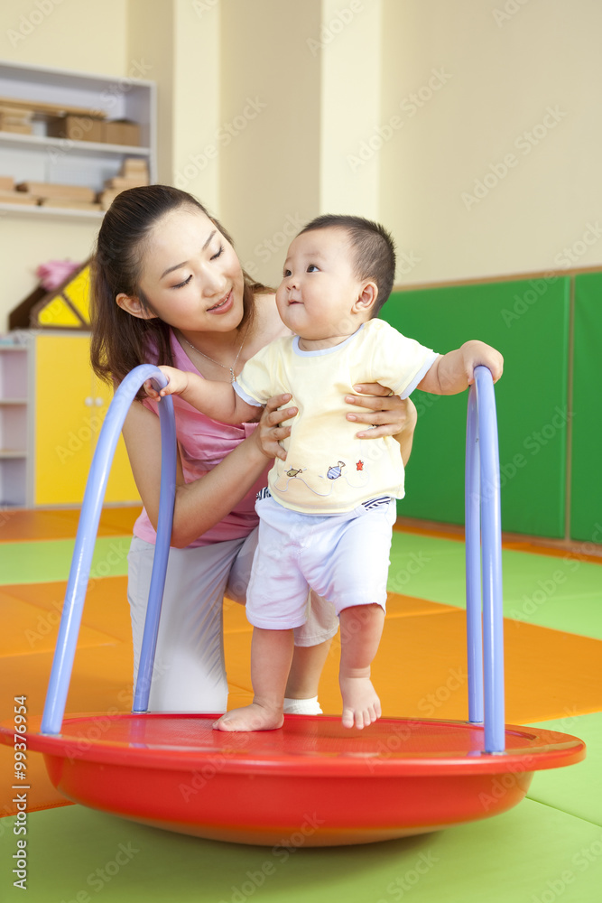 Mother Playing With Son