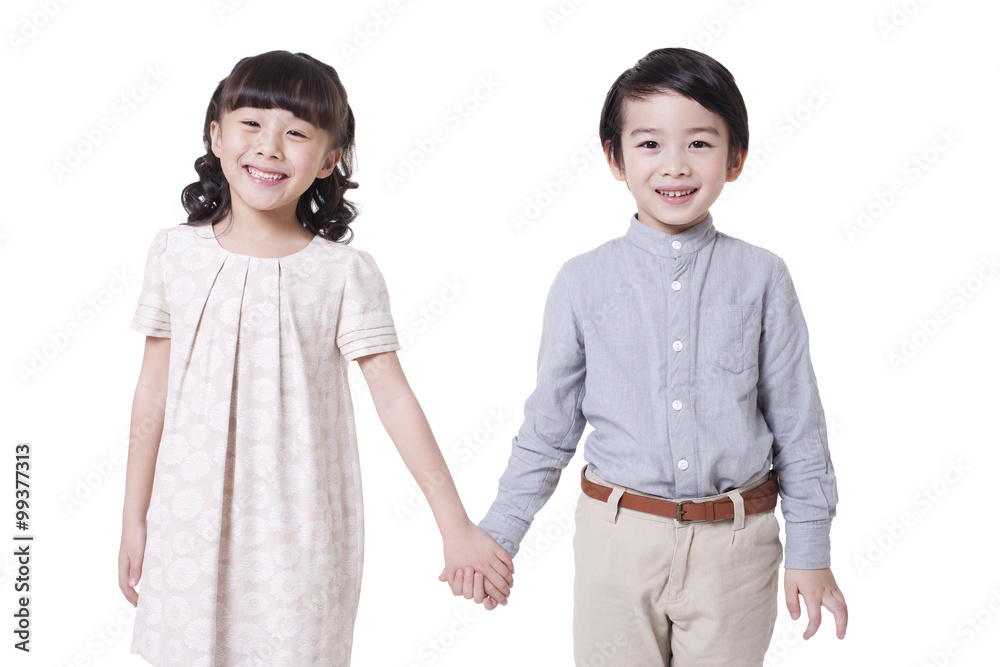 Cute boy and girl holding hands