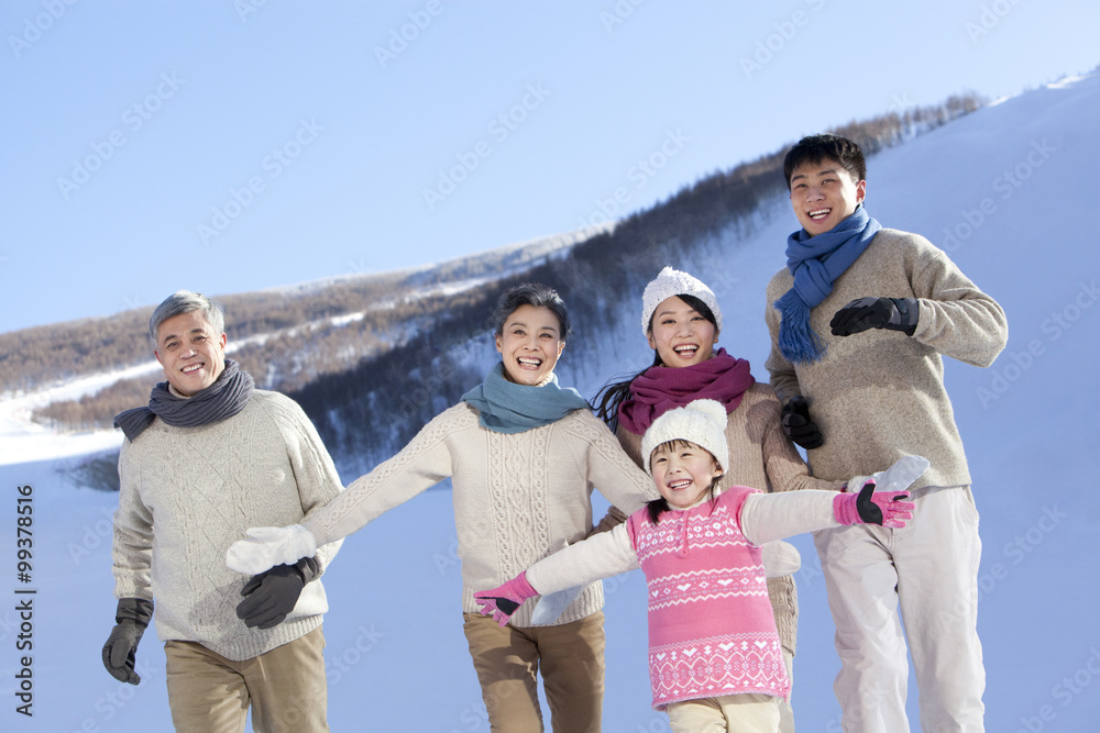 Family having fun in snow