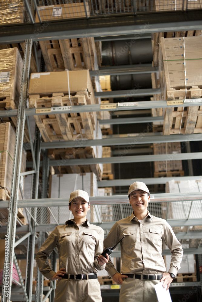 Male and female Chinese warehouse worker