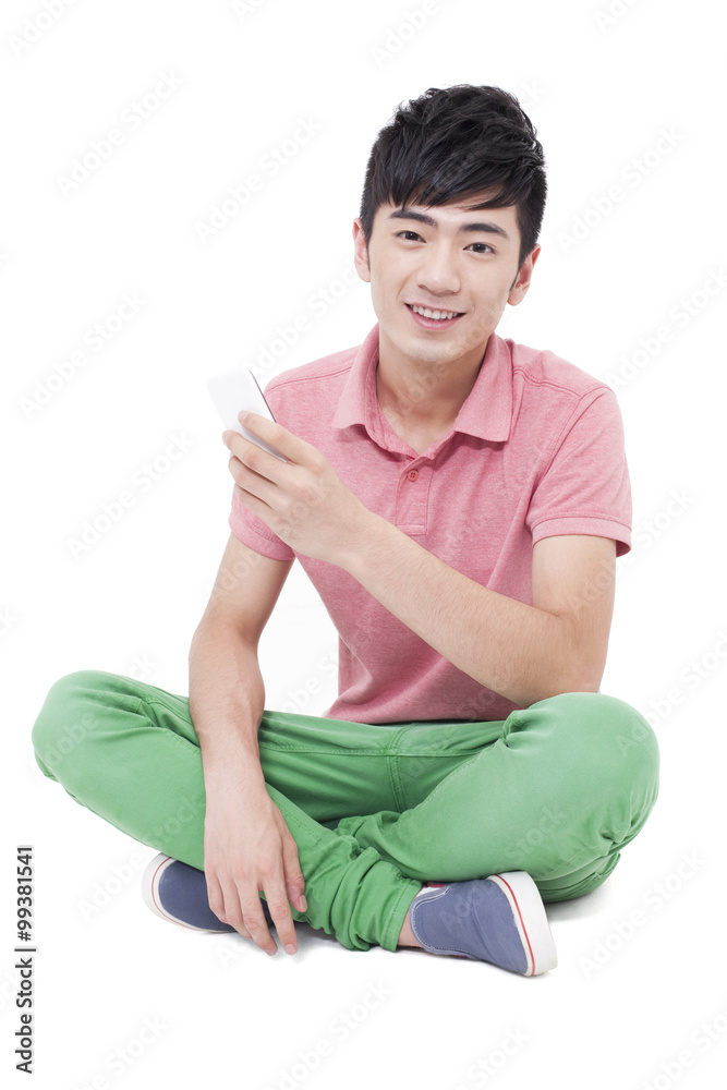 Happy young man and mobile phone