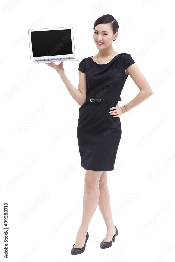 Fashionable businesswoman with laptop