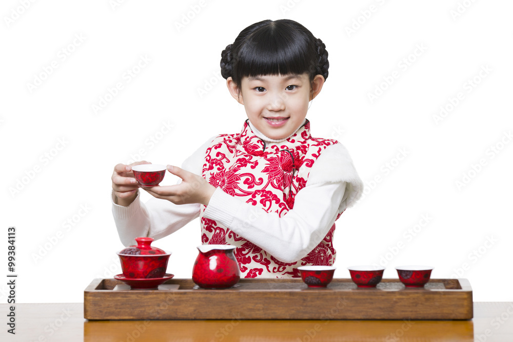 Happy girl performing tea ceremony