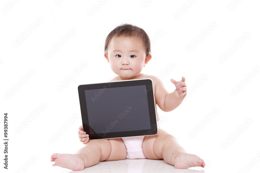 Cute baby girl with digital tablet