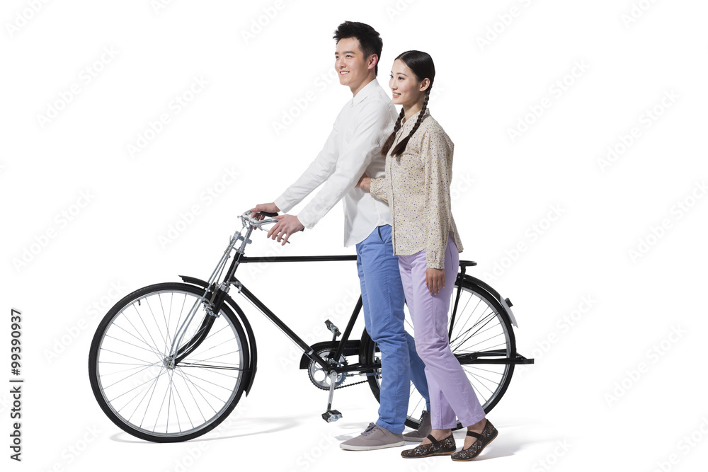 Young couple and bicycle in 1970s