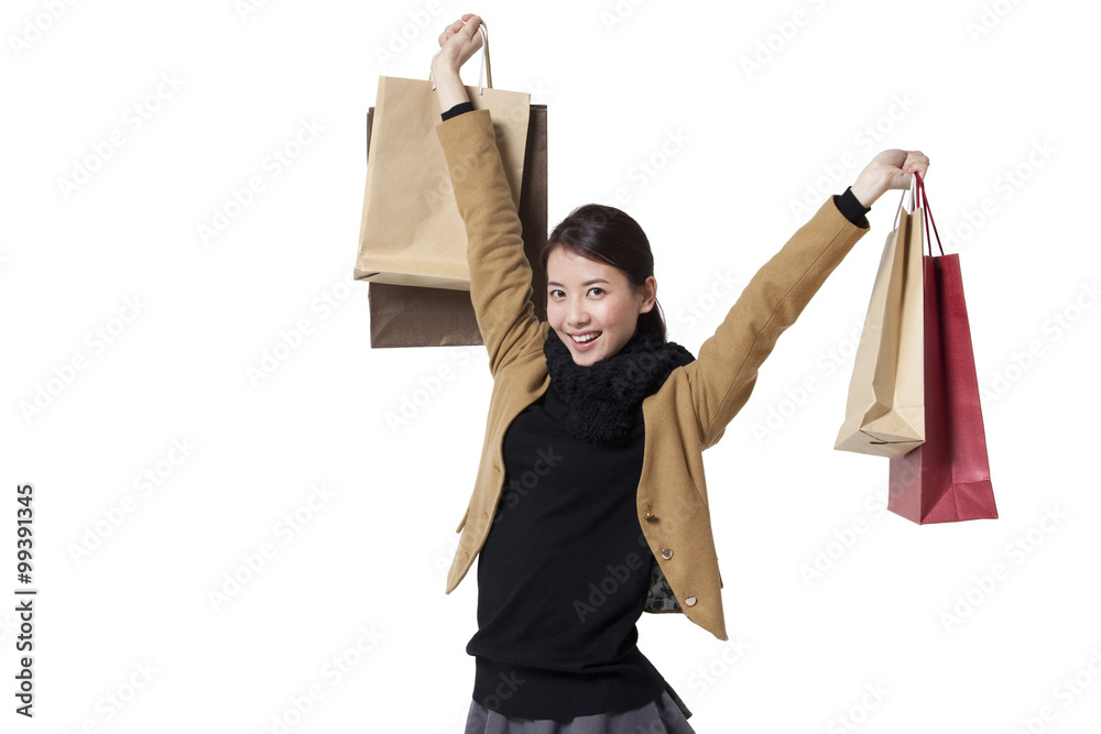 Stylish young woman going shopping