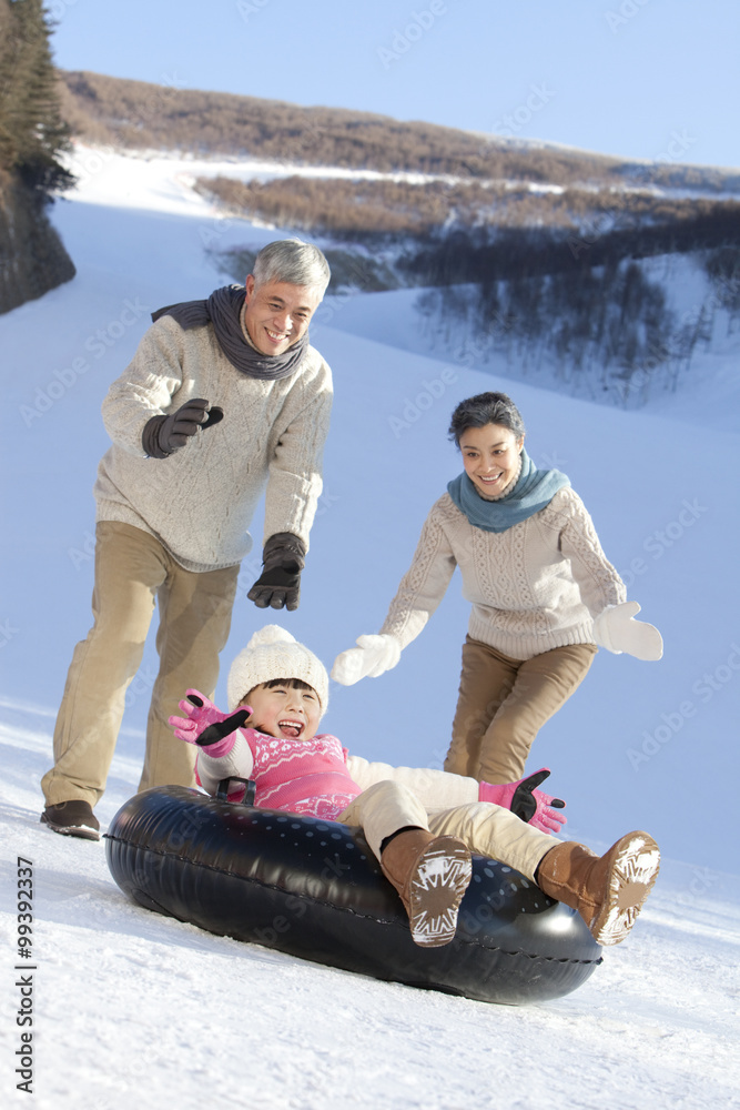 Family having fun in snow