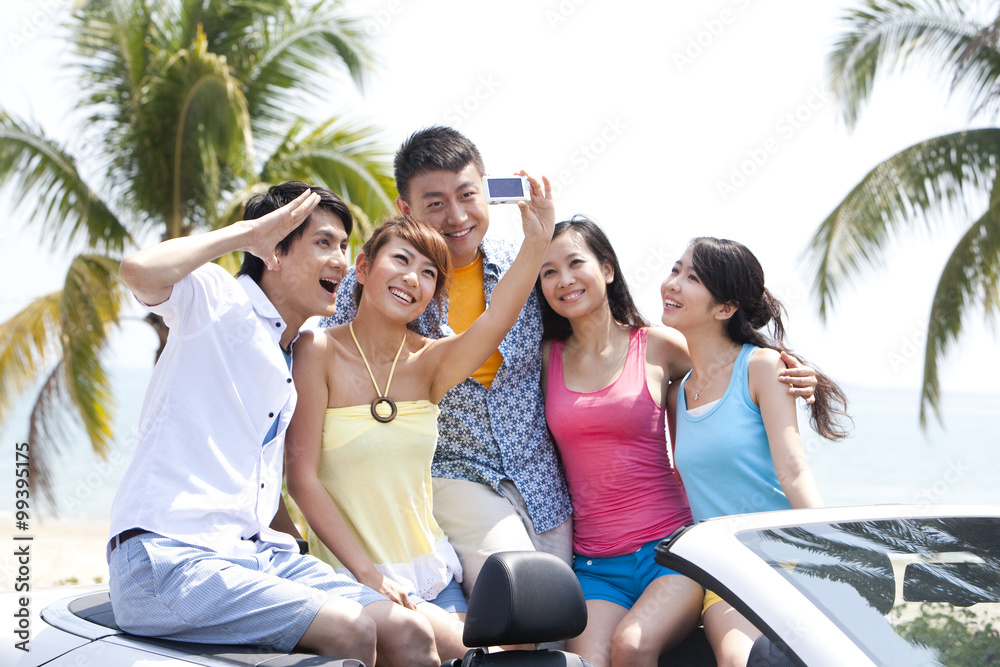 Friends Having Fun in a Convertible