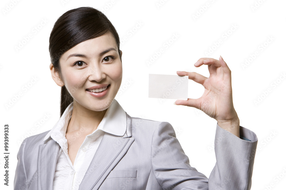 Businesswoman holding a card