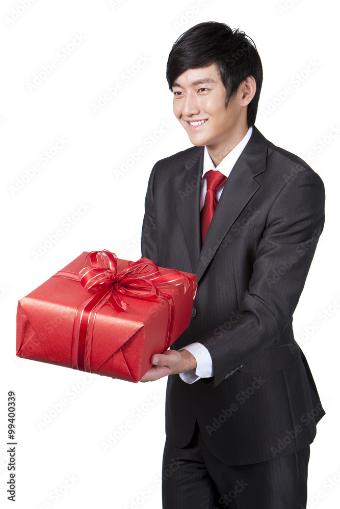 Happy Businessman Holding a Gift