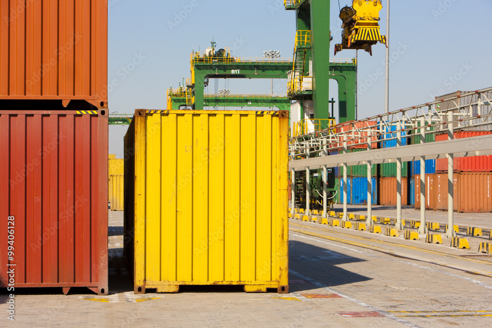 Cargo containers and cranes in shipping dock