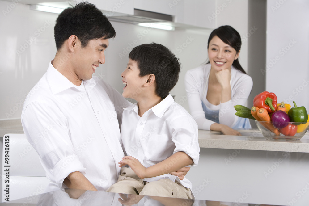 Family in modern kitchen