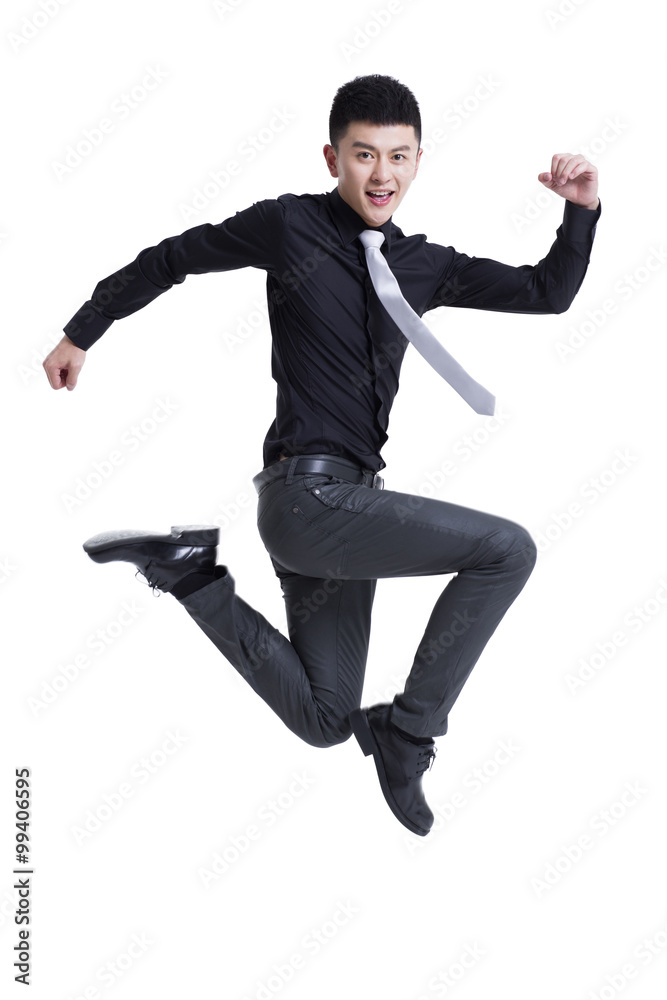 Cheerful young man jumping