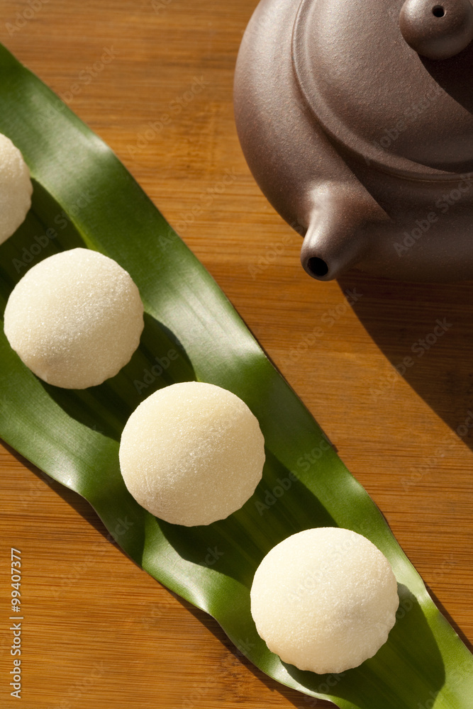 Overhead view of rice ball served on leaf