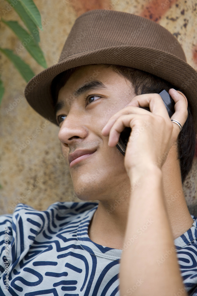 Young man using cell phone