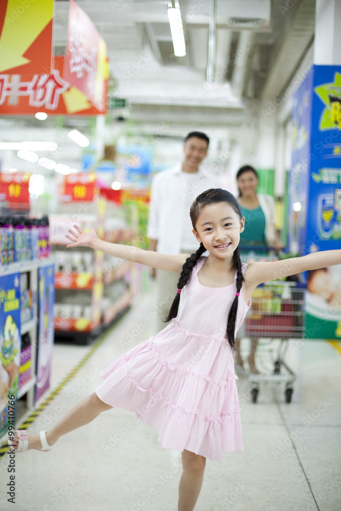 Family shopping in supermarket