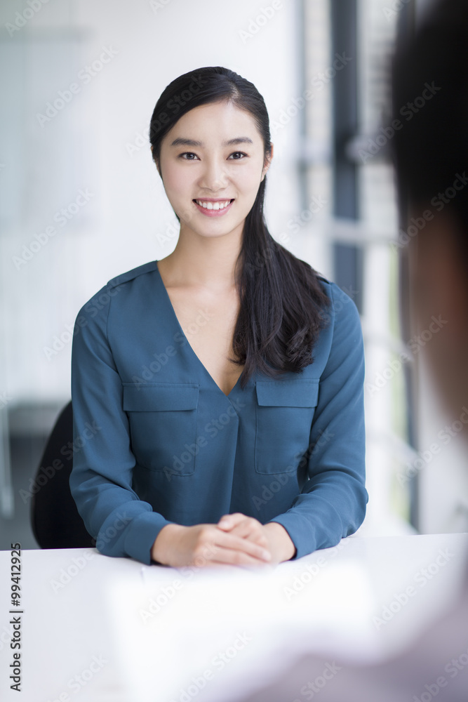 Young woman interviewing for a job