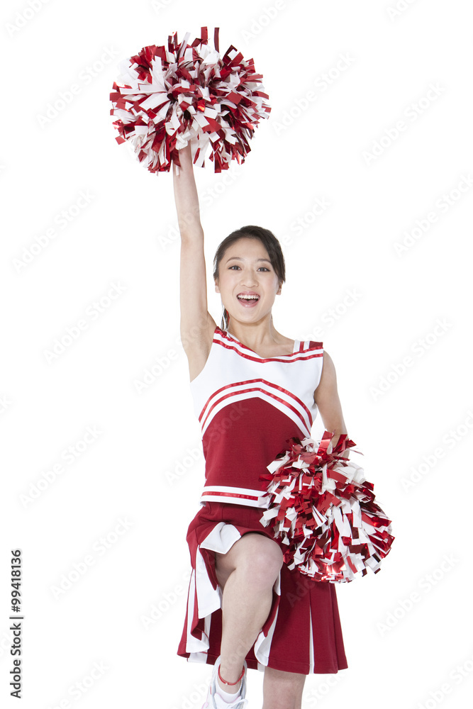 Cheerleader in action with her pom-poms