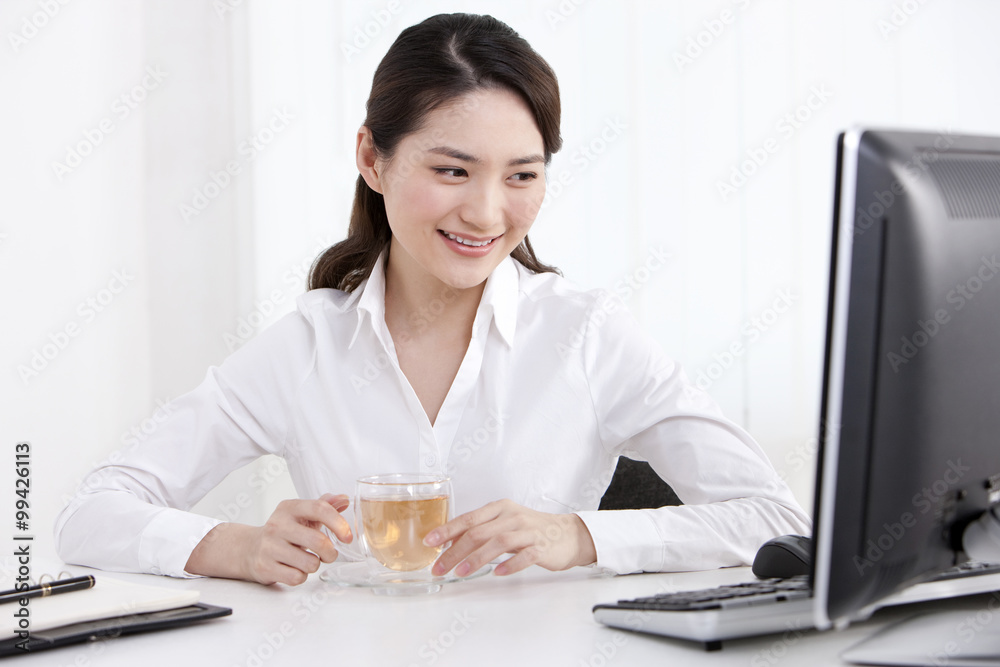 Young businesswoman in office