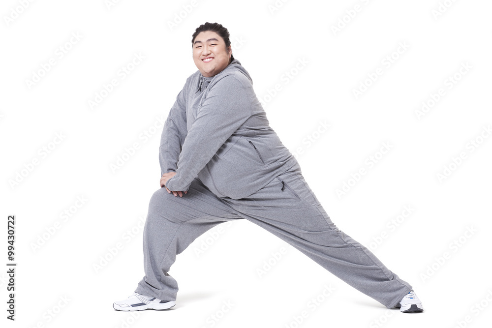 Overweight man exercising