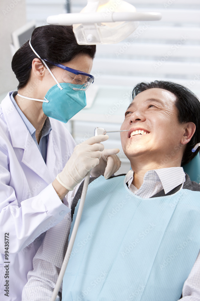 Patient receiving treatment in dental clinic