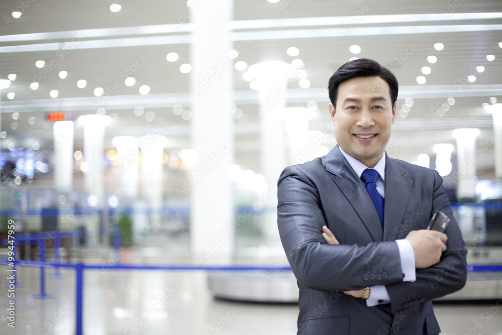 Portrait of businessman at the airport