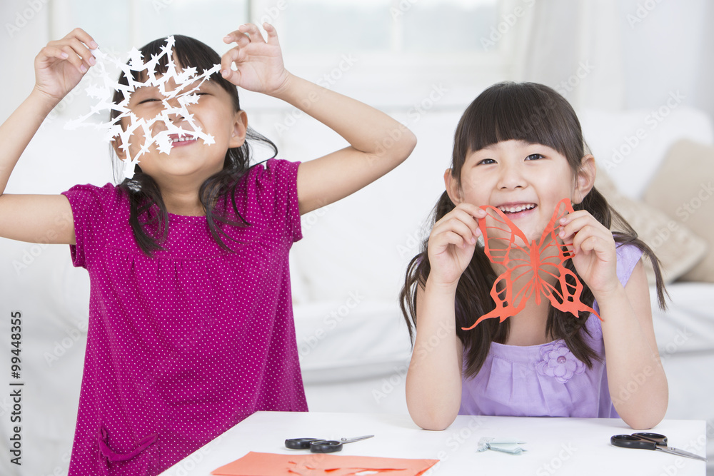 Girls making papercut