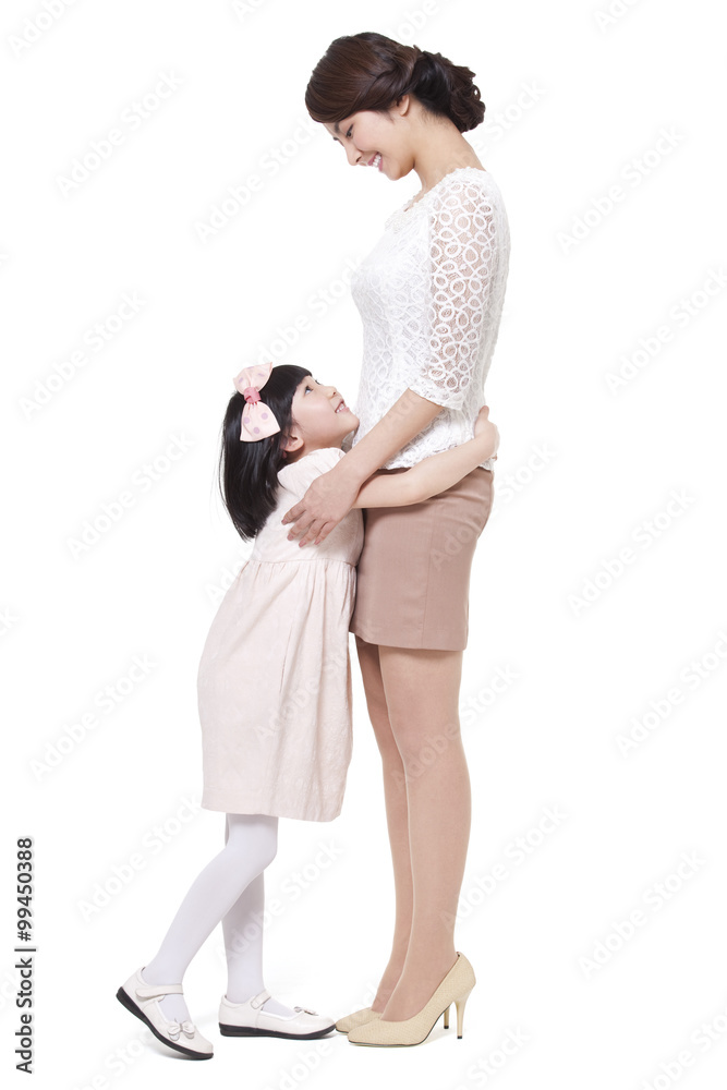 Intimate mother and daughter embracing