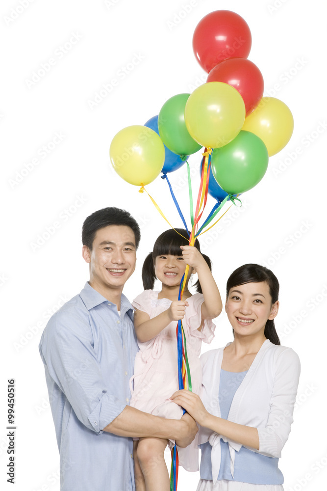 Portrait of family with balloons