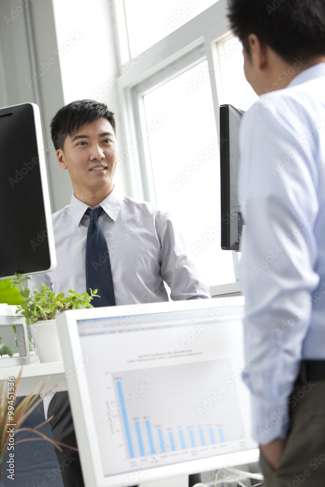 Businessmen working in office