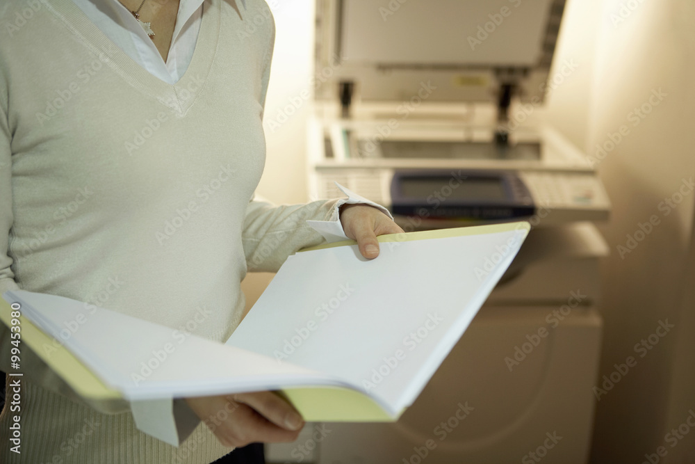 Young Woman Standing In Office