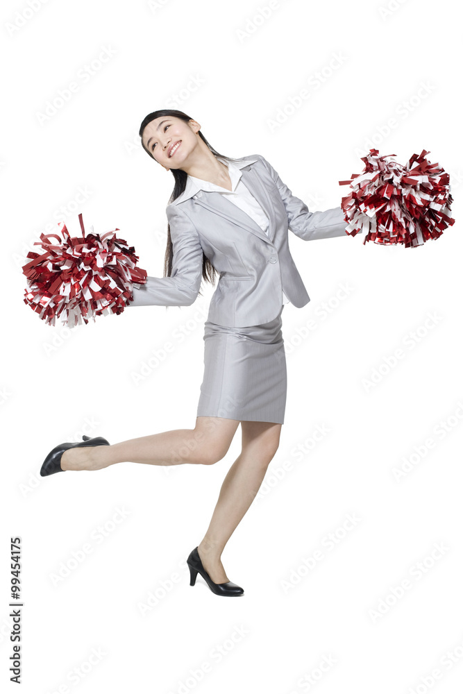 A businesswoman cheering with pompoms