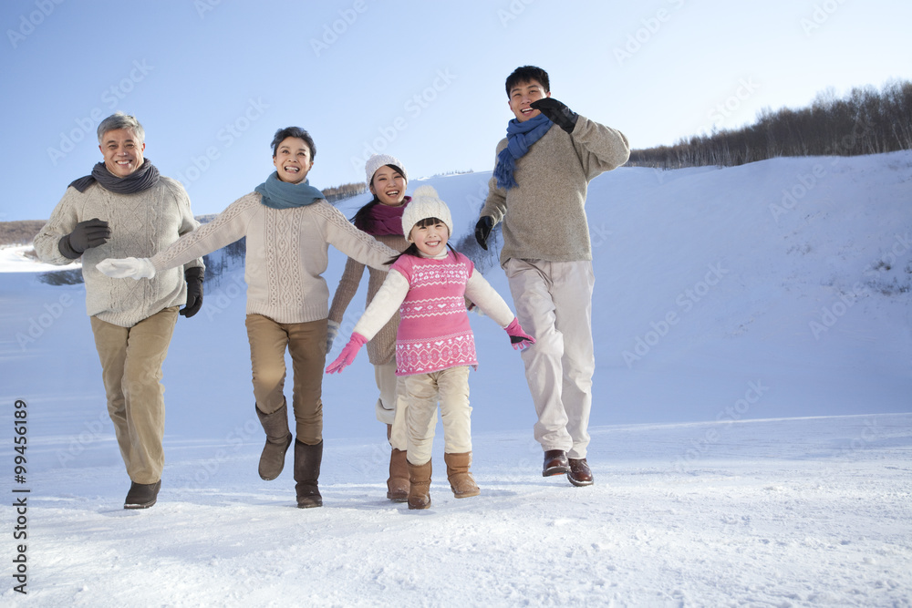 Family having fun in snow