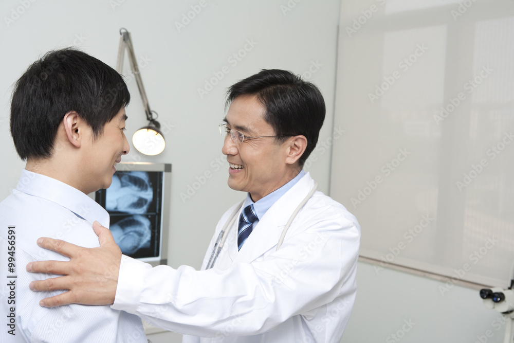 Doctor speaking with his patient