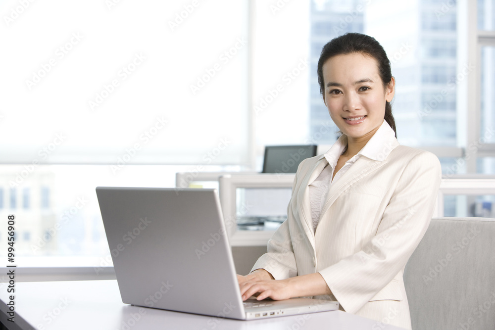 Office worker using her computer