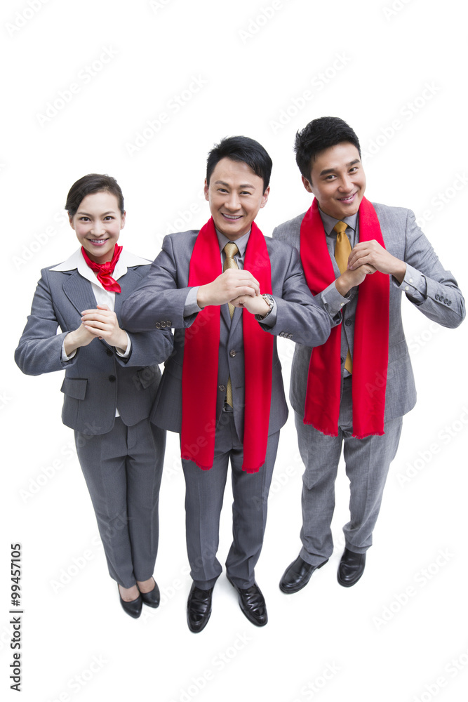 Happy business people offering traditional Chinese New Year greeting