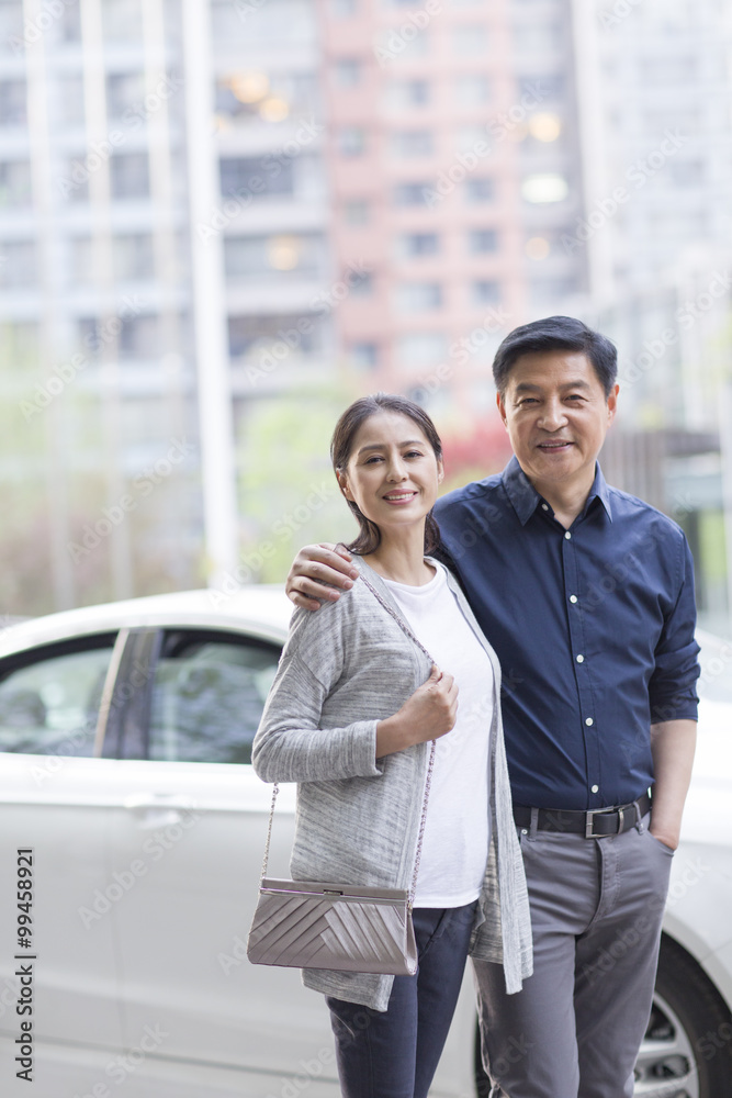 Happy mature couple walking