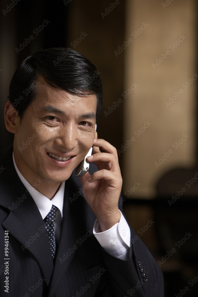 A business leader on his cell phone