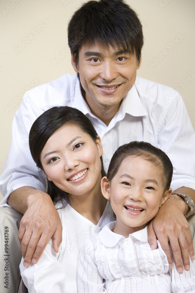 Portrait of a family of three