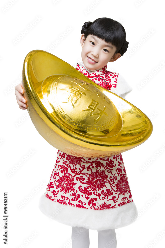 Happy girl holding a large Chinese traditional currency yuanbao