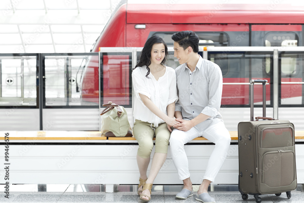 Young couple at subway station