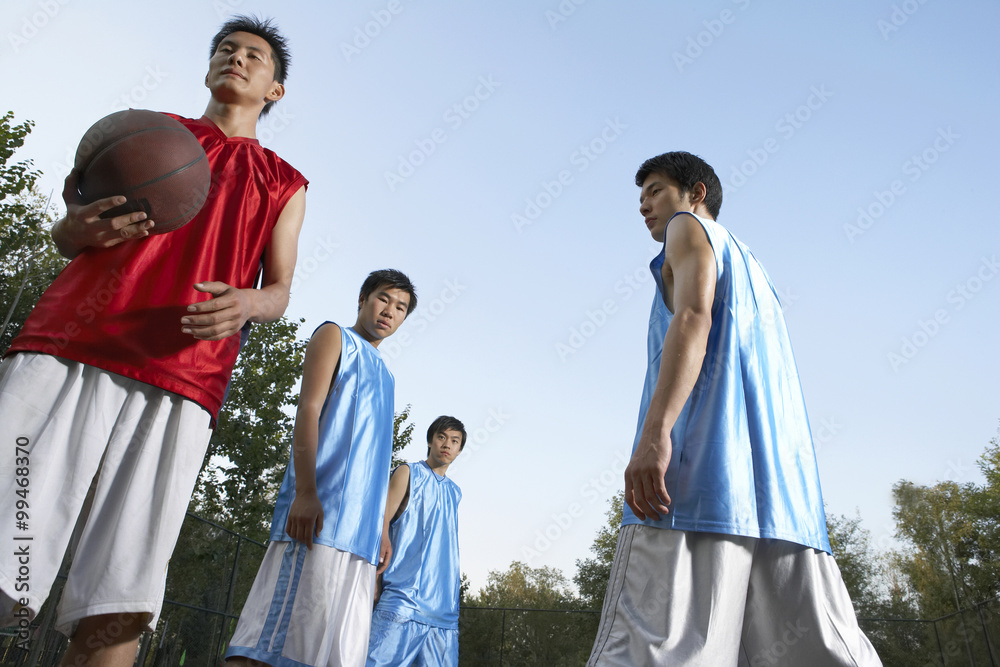 Basketball Team On Basketball Court