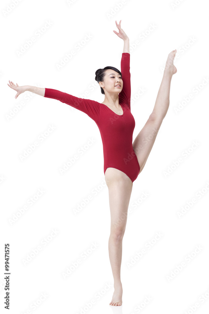 Female gymnast performing rhythmic gymnastics