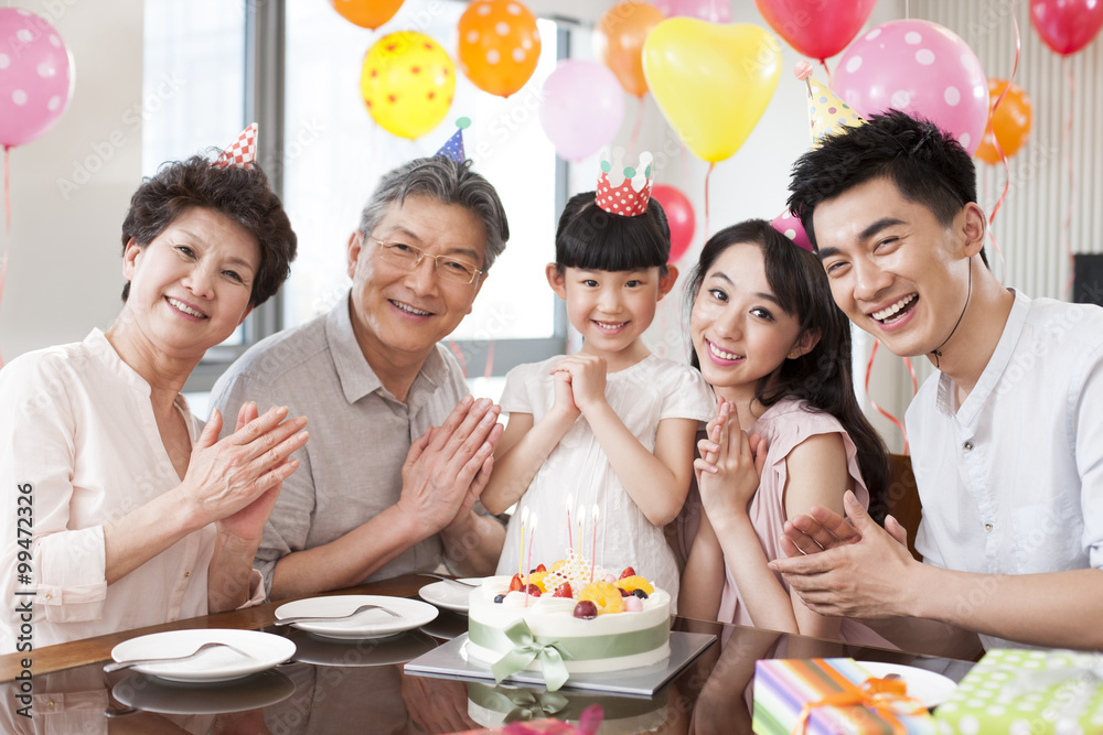 Happy family celebrating birthday