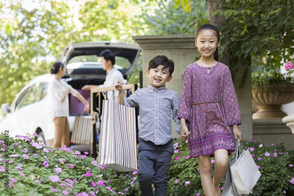 Young family coming back from shopping