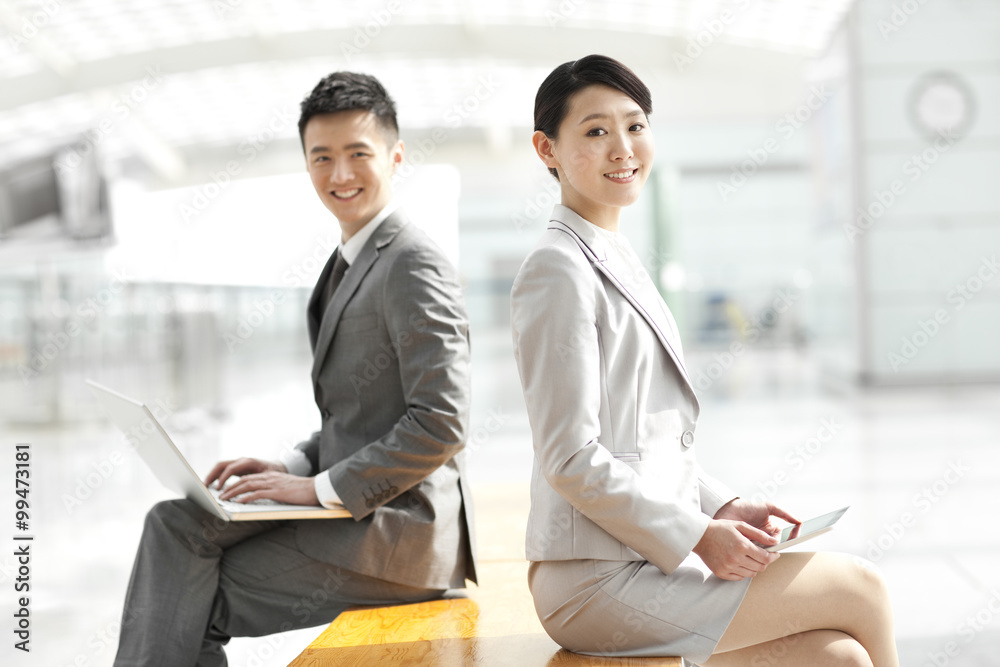 Young businessman persons waiting for train at subway station