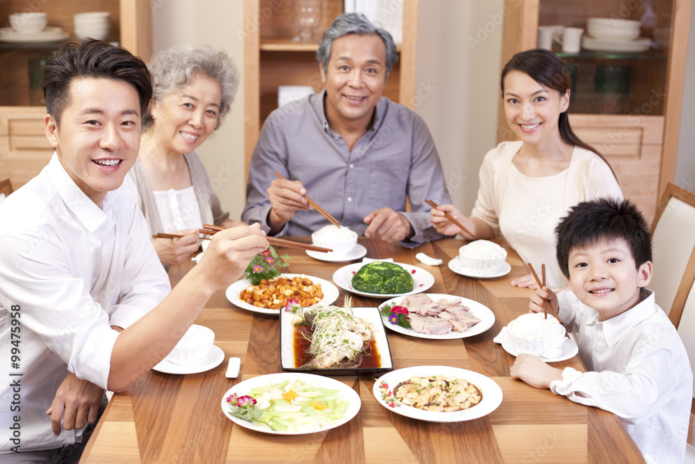 Happy family enjoying meal time