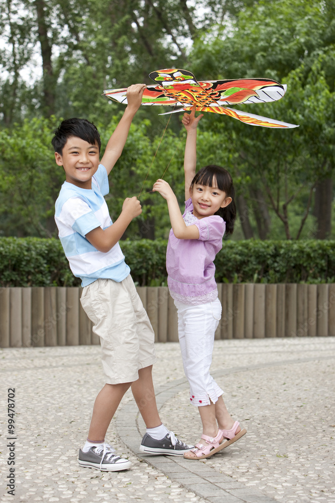 Children flying a kite 