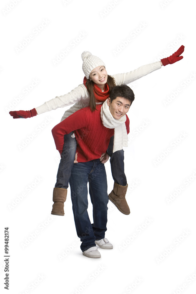 Young couple in winter clothes